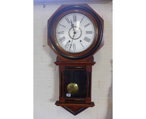An 8 day American wall clock with striking movement on gong - 87cm tall 