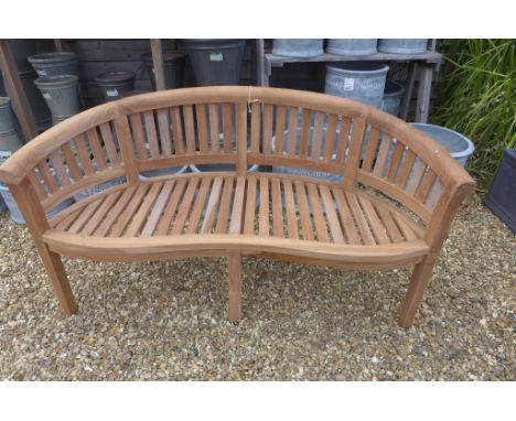 A Bramblecrest teak banana bench , ex-display