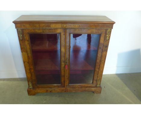 A 19th century walnut inlaid two door cabinet with ormulu mounts on bracket feet, 107cm tall x 105cm x 32cm 