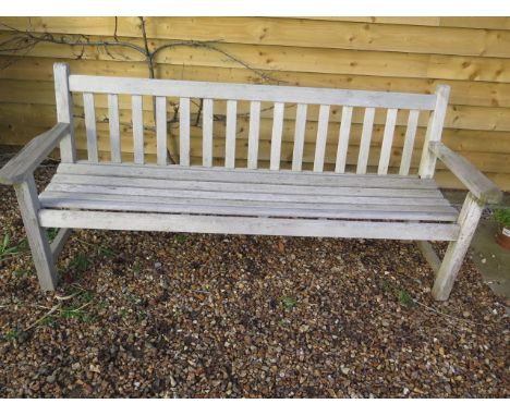 A good quality teak garden bench, 190cm wide 
