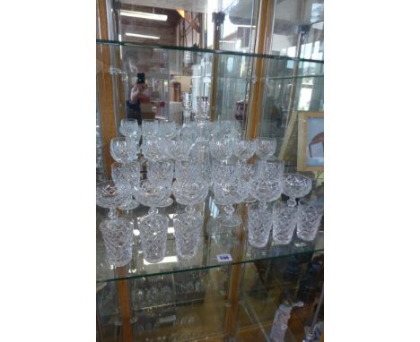 Waterford crystal twenty-five pieces including a decanter, six tall white glasses, six wine, six Champagne and six beakers, a