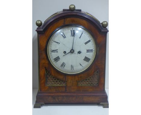 A good quality late 18th century English bracket clock, the arched case veneered in mahogany with brass grills, double fusee 