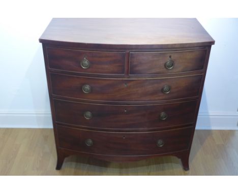 A Georgian mahogany bow fronted five drawer chest on splayed bracket feet, 97cm tall x 94cm x 51cm 