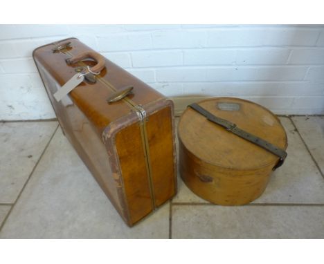 A vintage Samsonite retro suitcase and a bentwood hat box with North East Railways label 