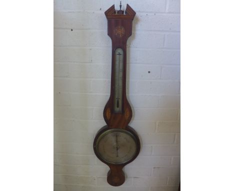 An inlaid mahogany barometer with thermometer, the dial signed J C Zambra, Saffron Walden, in need of some restoration, 99cm 