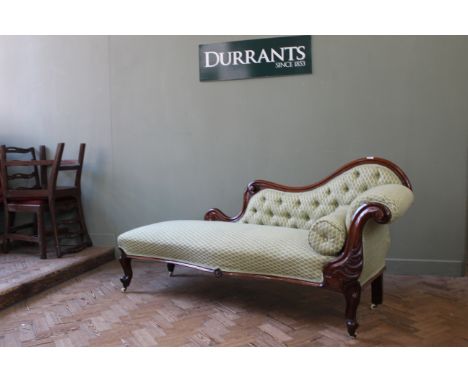 A mid Victorian mahogany button back chaise longue