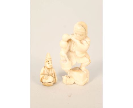 A Japanese ivory okimono of a boy plus a small netsuke