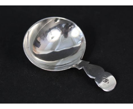 A George III silver caddy spoon with scalloped stem, makers mark IB, hallmarked London 1817, length approx 3 3/4"