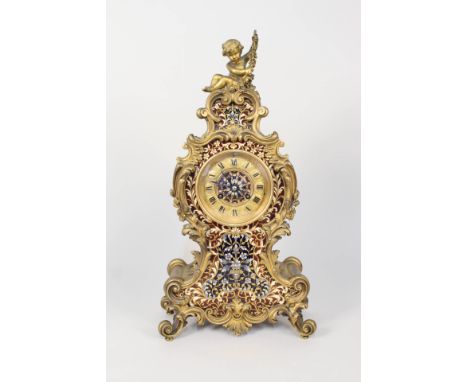 A 19th Century French ormolu and champleve enamel mantel clock with cherub mount, height 19"