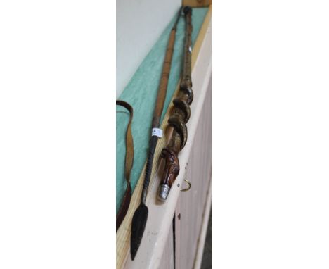 An African spear plus a walking stick