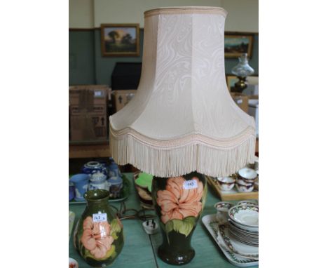 A Moorcroft Hibiscus lamp and vase