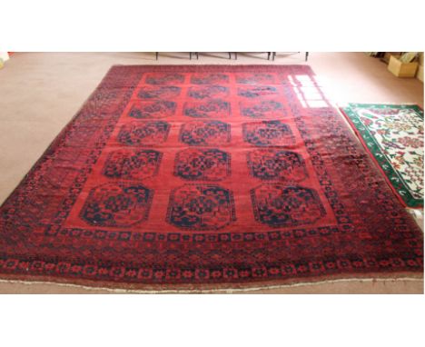 An Afghan carpet, 144" x 107"