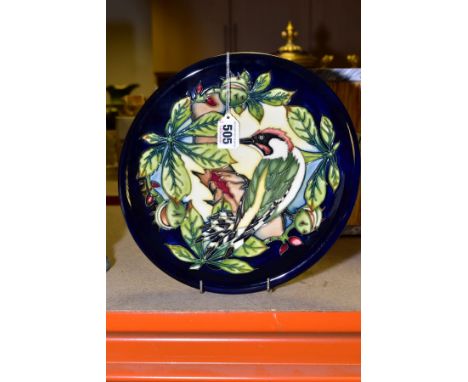 A MOORCROFT POTTERY CHARGER IN THE INGLEWOOD GREEN WOODPECKER PATTERN, circa 2002 by Philip Gibson, printed, painted and impr