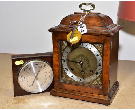 AN ELLIOT OF LONDON BURR WALNUT VENEERED BRACKET CLOCK, eight day movement, gong strike, Arabic numbers, key and pendulum, he