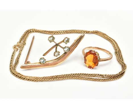 THREE ITEMS OF JEWELLERY, to include a yellow metal ring set with a single claw set, oval cut orange stone assessed as citrin