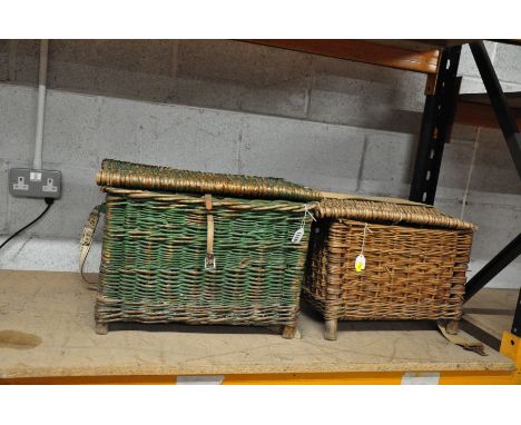 TWO VINTAGE WICKER FISHING BASKETS, the larger is over painted green with a shoulder strap, width 51cm x depth 34ccm x height