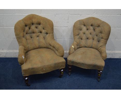 A PAIR OF LATE VICTORIAN LADIES AND GENTS ARMCHAIRS, on turned front legs and ceramic casters