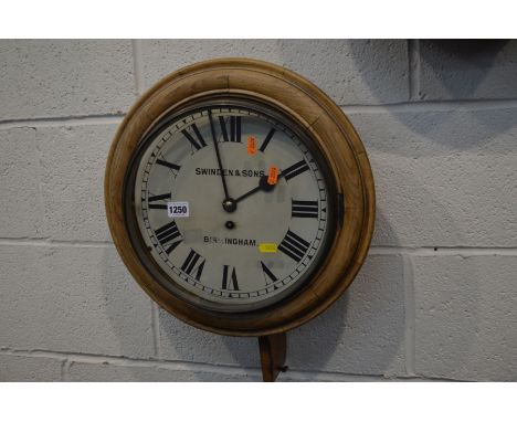AN EARLY 20TH CENTURY CIRCULAR WALL CLOCK by Swindon and Sons, Birmingham with single fusee movement, pendulum and key 42cm e