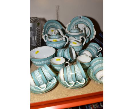 A VICTORIAN PORCELAIN TEA SERVICE IN TURQUOISE AND WHITE, decorated with a band of anthemian design, comprising a pair of bre