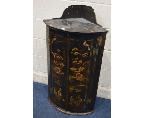 A 19TH CENTURY ORIENTAL EBONISED BOWFRONT TWO DOOR CORNER CABINET, with chinoiserie detail, width 59cm x depth 40cm x height 