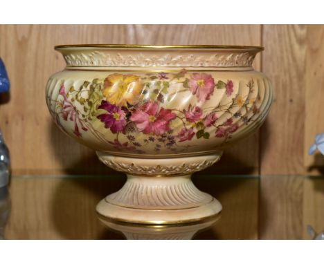 A ROYAL WORCESTER BLUSH IVORY PEDESTAL BOWL, with wrythern moulded body florally decorated, shape No 1805, Rd No 253409, rim 