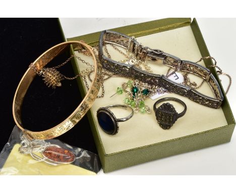 A SELECTION OF ITEMS, to include a white metal marcasite openwork bracelet, a white metal marcasite ring, a white metal openw