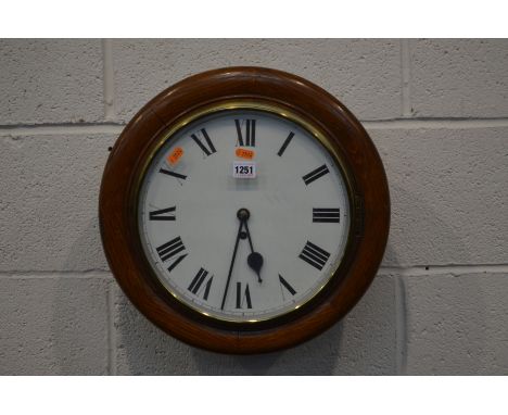 AN EARLY 20TH CENTURY CIRCULAR WALL CLOCK with Fusee movement, key and pendulum 42cm external diameter