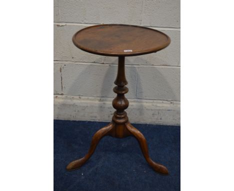 A GEORGE III MAHOGANY CIRCULAR DISH TOP TRIPOD TABLE (one loose leg)