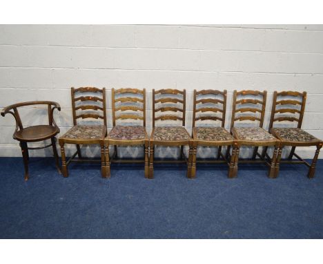 A BENTWOOD SMOKERS ARMCHAIR, together with six oak ladder back chairs (7)