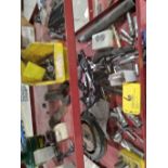 Assorted items on 3 shelves, reamers & bits.