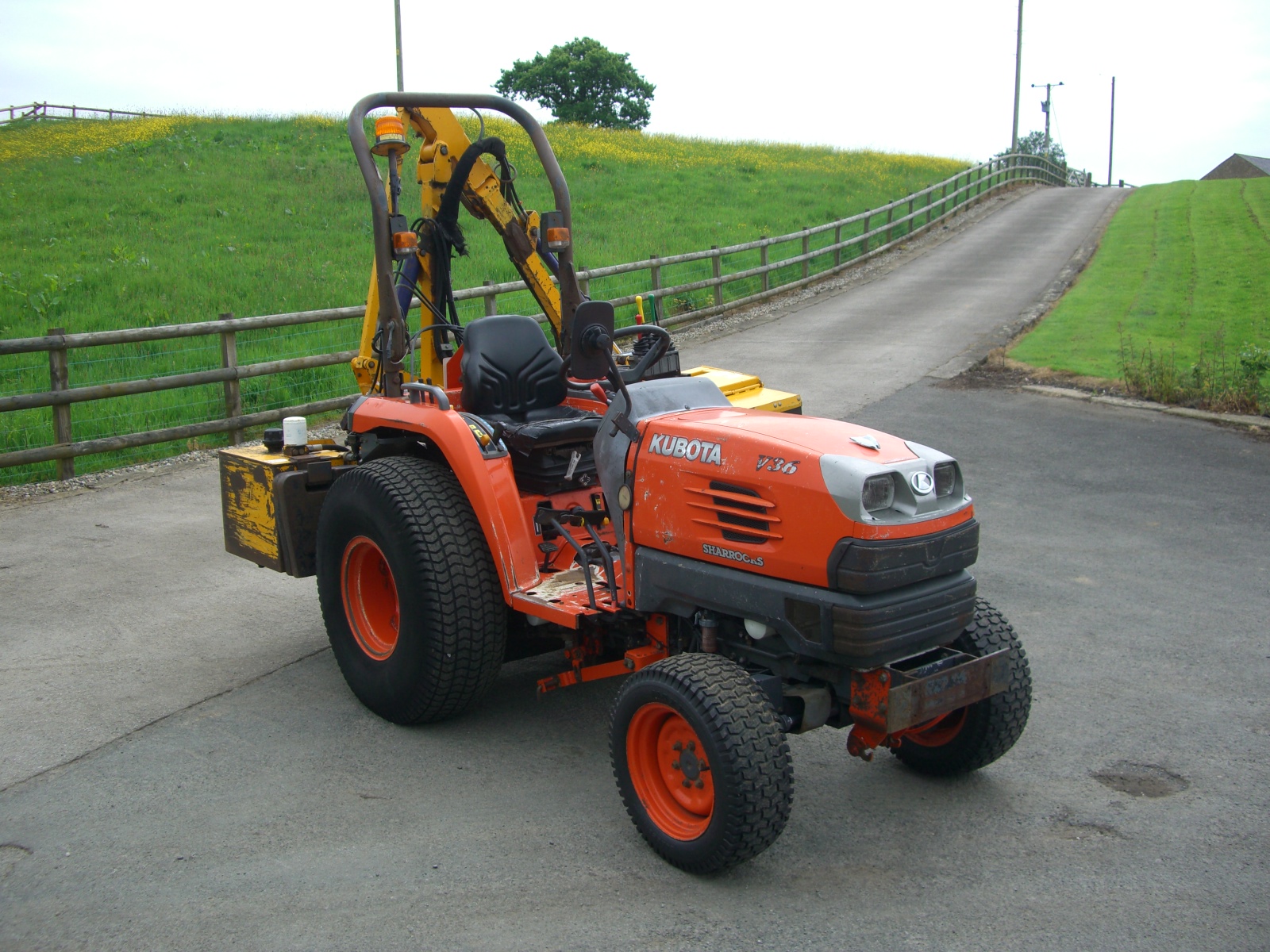 Kubota STV 36 with mower and rear mounted flail