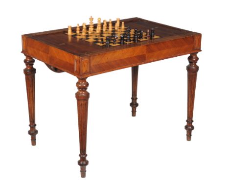  A Victorian hardwood tric-trac table,   circa 1870, with removeable chequerboard top, one side with traditional eight x eigh