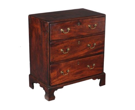  A George II mahogany bachelor's chest,   circa 1750, the caddy moulded top above three long drawers and shaped bracket feet,