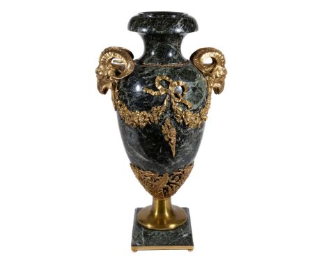  A green serpentine marble and gilt metal mounted urn,   20th century, possibly previously a table lamp, with everted rim and