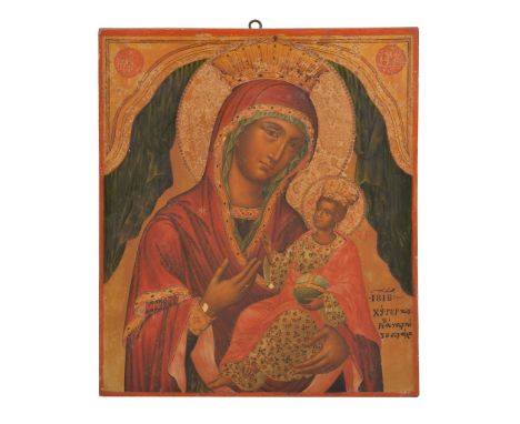  Greek School, dated 1818,  Mother of God Hodegitria,   a painted and parcel gilt icon,   tempera on prepared panel, traditio