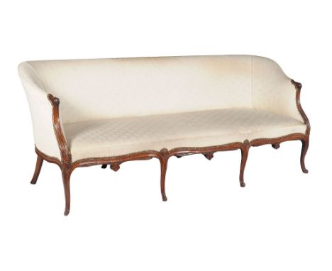  A George III mahogany sofa,   circa 1770, in the French Hepplewhite manner , the shaped rectangular back incorporating shape