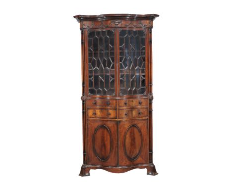  A mahogany secretaire bookcase in George III style,   early 20th century, after the manner of Thomas Chippendale, of serpent