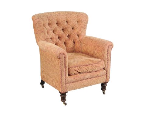  A Victorian mahogany and button upholstered armchair,   circa 1860, covered in a Paisley or Kashmir design material, 93cm hi
