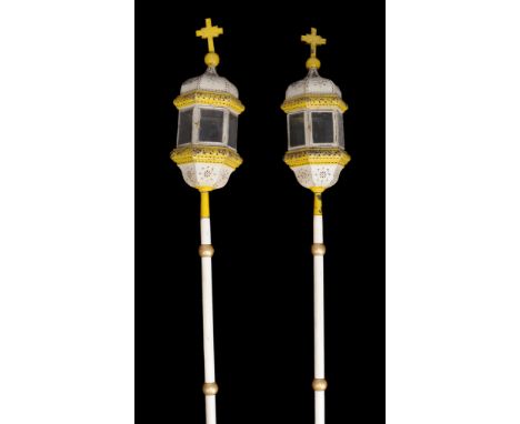  A pair of Continental  tole peinte   pole lanterns,   19th century, decorated in yellow and cream, each  with crucifix finia