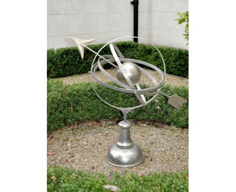 An electroplated metal armillary sphere,   of recent manufacture, the outer ring and internal sphere held by an arrow, with 