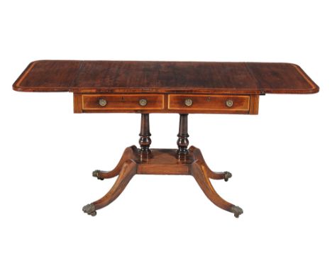 Ω A Regency rosewood and satinwood banded sofa table , circa 1820, with two short frieze drawers to one long end, 71cm high, 