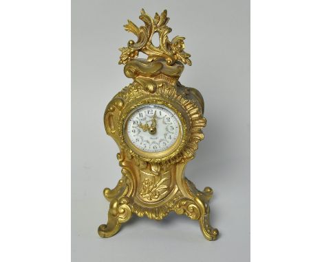 Gilt metal ornate French carriage clock, Douffroy Marseille, with painted enamel face, height 19 cm width 12 cm