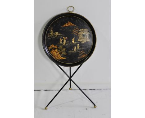 Toleware, campaign table, black painted, oriental design, folding on tripod legs, with hanging hook, height 53 cm width 47.5 