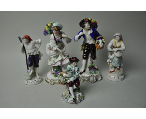 5 various Sitzendorf porcelain figures, including the grape pickers measuring 24 cm each, 2 further figures measuring 18 cm a