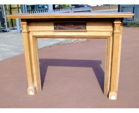 Fire surround, mahogany, circa 1900' reeded sides, carved centre panel, height 128 cm width 166 cm depth 30 cm
