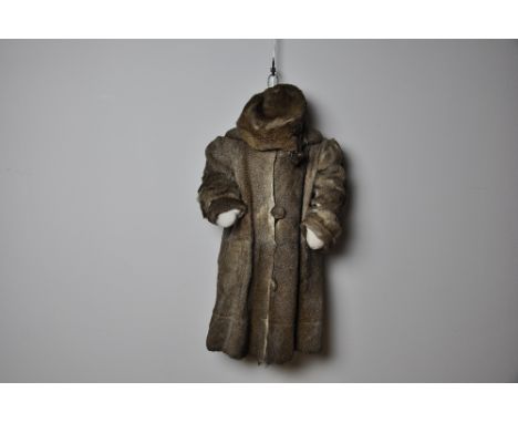 Child's reindeer coat, muff and hat on model stand, height 73 cm width 36 cm