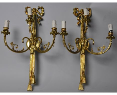 Wall lights, pair of gilt scroll fittings, three arms, long back plate with bow and tassel decoration, Georgian style, height