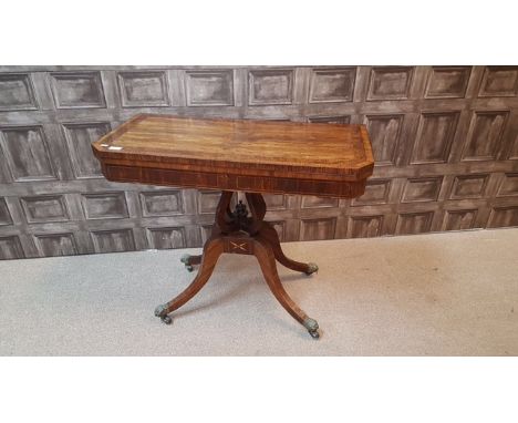 ATTRACTIVE REGENCY ROSEWOOD AND BURR WALNUT CROSSBANDED FOLD OVER CARD TABLE the top with canted corners, folding to reveal a