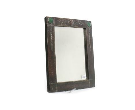 GLASGOW STYLE ARTS AND CRAFTS WALL MIRROR of rectangular form and with two green enamel roundels, 45cm x 35cm 