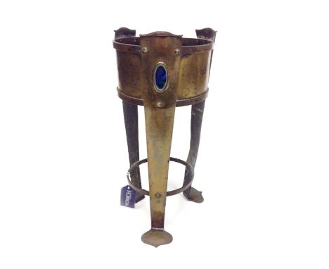 ARTS & CRAFTS BRASS AND ENAMEL JARDINIEREin the style of Margaret Gilmour, of tapering circular form, the three legs with ova